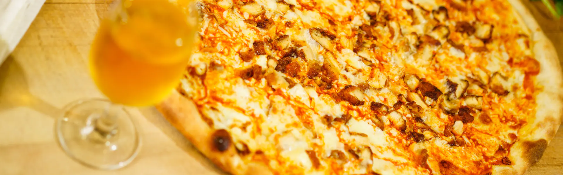 Buffalo Chicken Pizza with beer in Hockessin, DE